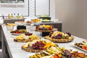 a buffet line with many different types of food at Homewood Suites by Hilton Philadelphia-City Avenue in Philadelphia