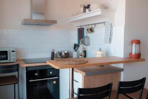 Η κουζίνα ή μικρή κουζίνα στο Apartamento sunset 1