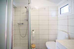 Phòng tắm tại Apartamento com vista 360 sobre o Funchal +8 ảnh