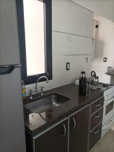 Køkken eller tekøkken på Complejo Médanos I + 1 billede