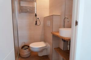 Ένα μπάνιο στο Apartamento sunset 1