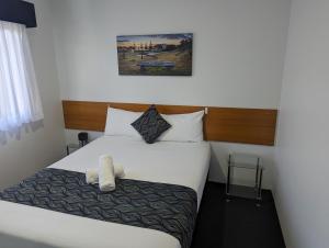 Haven Waters Motel & Apartments客房内的一张或多张床位