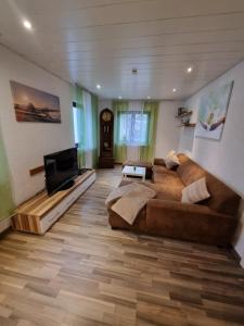 Χώρος καθιστικού στο Ferienwohnung Elsenztal