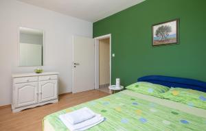 Posteľ alebo postele v izbe v ubytovaní Holiday Home Lovorno Croatia