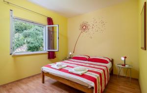 Posteľ alebo postele v izbe v ubytovaní Holiday Home Lovorno Croatia