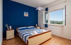 Posteľ alebo postele v izbe v ubytovaní Holiday Home Lovorno Croatia