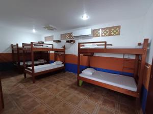 Postel nebo postele na pokoji v ubytování Hacienda bambú