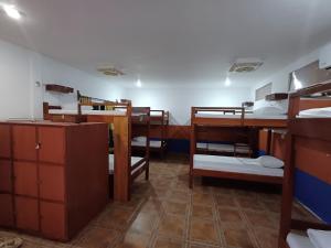 Postel nebo postele na pokoji v ubytování Hacienda bambú