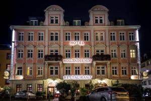 a large building with a hotel in front of it at City Partner Hotel Holländer Hof in Heidelberg