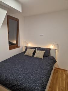 Letto o letti in una camera di Divcinova - Apartman Gorski