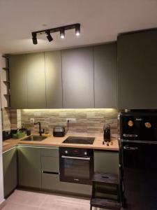 Cucina o angolo cottura di Divcinova - Apartman Gorski