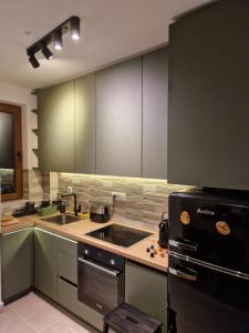 Cucina o angolo cottura di Divcinova - Apartman Gorski