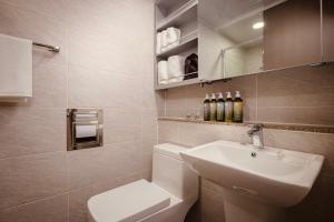 Ένα μπάνιο στο Sollago Myeongdong Hotel & Residence