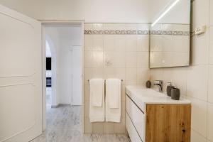 Kuchyň nebo kuchyňský kout v ubytování Diamond & Pearl + 27 fotografií