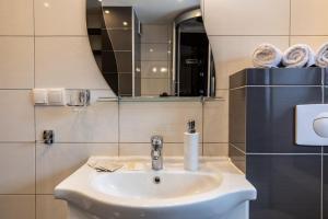 Kúpeľňa v ubytovaní Apartament TatraVika z basenem i widokiem