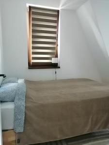 Krevet ili kreveti u jedinici u okviru objekta Aries apartman Divčibare