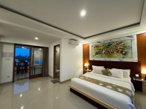 Ένα ή περισσότερα κρεβάτια σε δωμάτιο στο GM Guest House Canggu +108 φωτογραφίες
