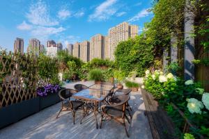 Wuyu Hotel - Chongqing Jiangbei Airport & Light Rail外面的花园