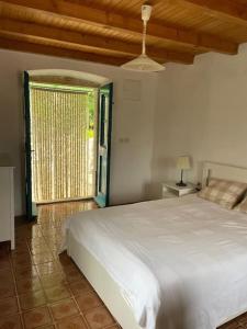 Postel nebo postele na pokoji v ubytování Studio apartman Tisa, Ćunski, Lošinj