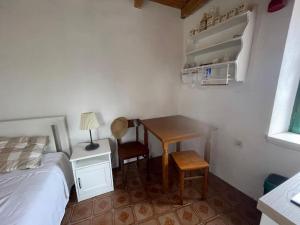 Postel nebo postele na pokoji v ubytování Studio apartman Tisa, Ćunski, Lošinj