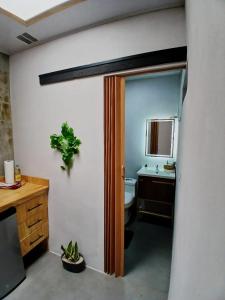 TV a/nebo společenská místnost v ubytování SJO Green Casita