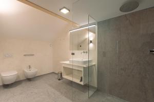 Koupelna v ubytování Appartements zi Ranna