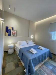 Posteľ alebo postele v izbe v ubytovaní StayBridge Apartments, Mesongi