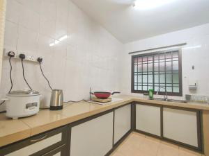 Η κουζίνα ή μικρή κουζίνα στο Molek Premium Suite 3R2B at Johor Bahru by Maco Home