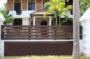 a wooden bench in front of a house at Season villa in Trincomalee