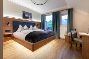 Postel nebo postele na pokoji v ubytování Design Hotel Frauenschuh