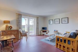 Televiisor ja/või meelelahutuskeskus majutusasutuses Martins Nest by Winterton Cottages