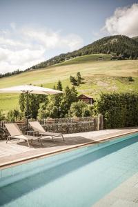 The swimming pool at or close to Falkensteiner Hotel & Spa Sonnenparadies