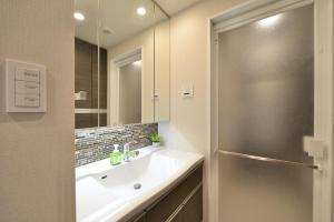 Ένα μπάνιο στο Branchera Naha Akebono Premist R65 +28 φωτογραφίες