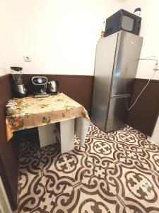 Kuchyň nebo kuchyňský kout v ubytování Ananász Apartman