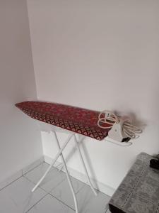 a shelf on a wall with a shoe on it at Roomstay Mok House - Unit 2 in Kuala Terengganu