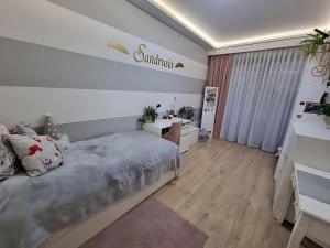 Ένα ή περισσότερα κρεβάτια σε δωμάτιο στο Luksusowy Apartament Glamour