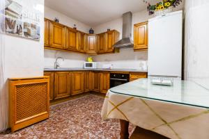 Kuchyň nebo kuchyňský kout v ubytování Alojamiento Santa Ana