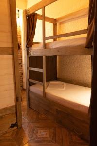 a couple of bunk beds in a room at Hostel ViktoryHome in Kryvyi Rih