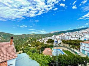 a view of a city from the roof of a house at Elegant Villa with Jacuzzi in Canillas de Albaida in Canillas de Albaida