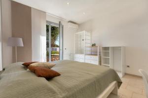 Postel nebo postele na pokoji v ubytování Villa Maier by Perle di Puglia + 40 fotografií