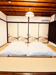 Letto o letti in una camera di 飛騨金山 古民家宿 恩家 -おんや-