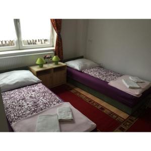 Letto o letti in una camera di Balaton Vendégház Fonyód