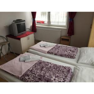 Letto o letti in una camera di Balaton Vendégház Fonyód