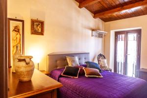 Postel nebo postele na pokoji v ubytování B&B Piazza Noua 1831