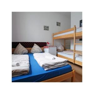 Letto o letti in una camera di Balaton Vendégház Fonyód