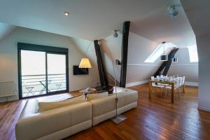 Posezení v ubytování L'Attik superbe appartement pour 5 personnes + 13 fotografií