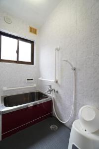 Koupelna v ubytování Guest House 伏見稲荷