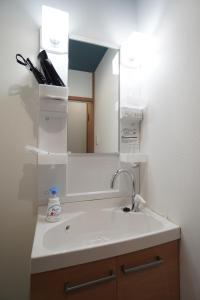 Koupelna v ubytování Guest House 伏見稲荷 + 34 fotografií