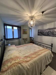 Postel nebo postele na pokoji v ubytování Casa Reggiaio