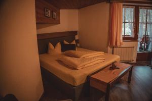 Postel nebo postele na pokoji v ubytování Haus Bergwind